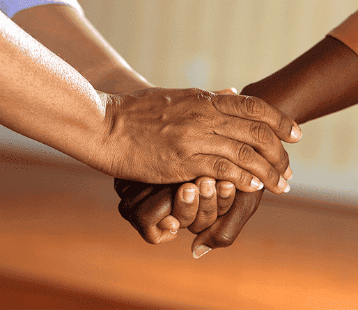 two-young-women-in-black-clothes-visiting-cemeter